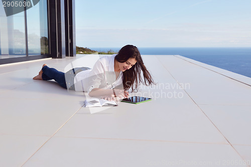 Image of relaxed young womant at home