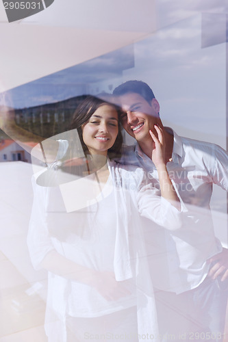 Image of relaxed young couple at home