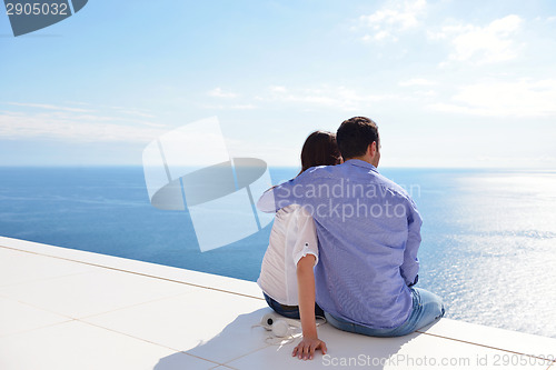 Image of relaxed young couple at home