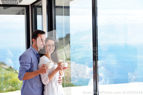 Image of relaxed young couple at home