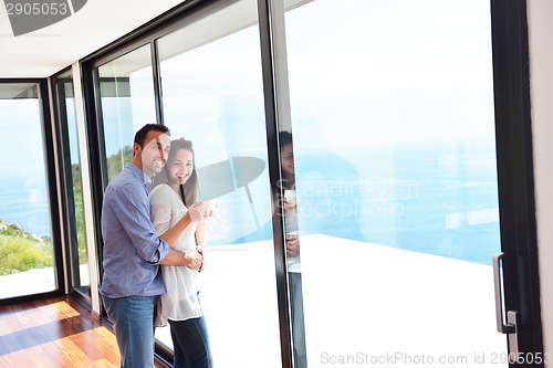 Image of relaxed young couple at home