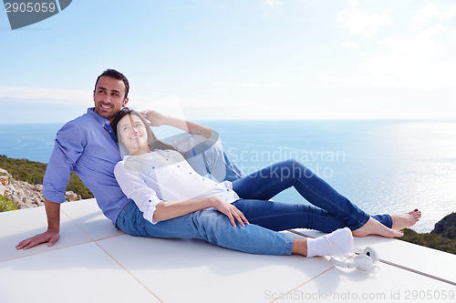 Image of relaxed young couple at home