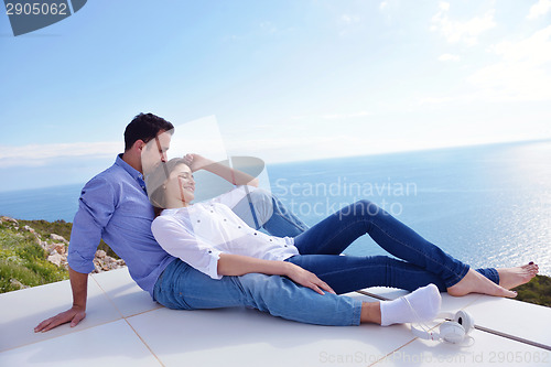 Image of relaxed young couple at home