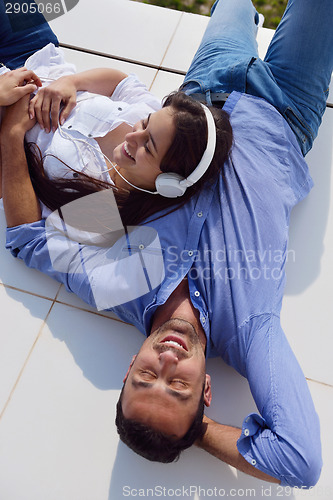 Image of relaxed young couple at home