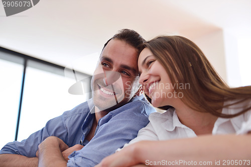 Image of relaxed young couple at home