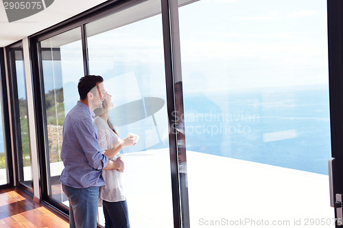 Image of relaxed young couple at home