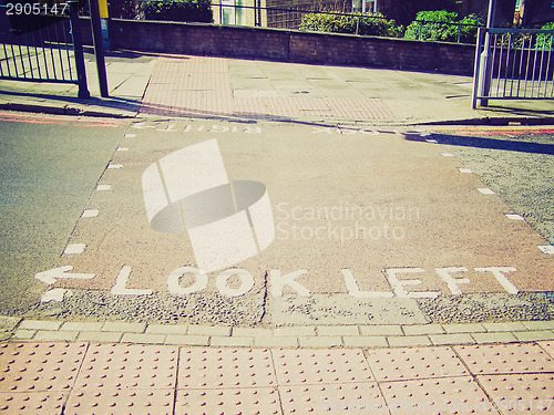 Image of Retro look Look right look left sign on London zebra crossing