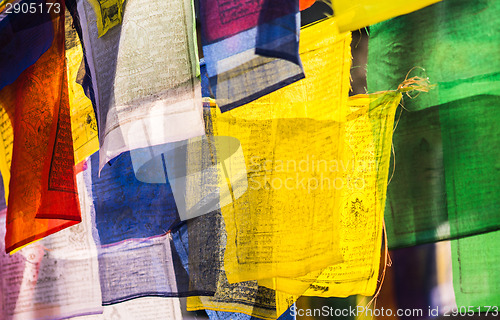 Image of Colorful buddhist Prayer flags with mantras