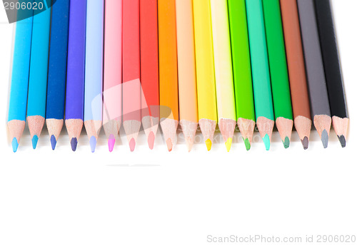 Image of Colored pencils on row