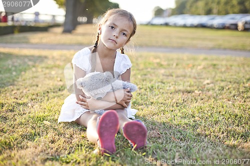 Image of Sad child in a park