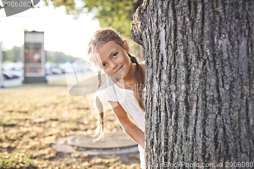 Image of Young girl playing at a park