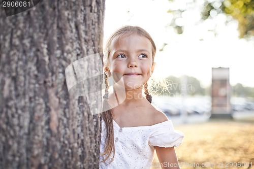 Image of Young girl playing at a park