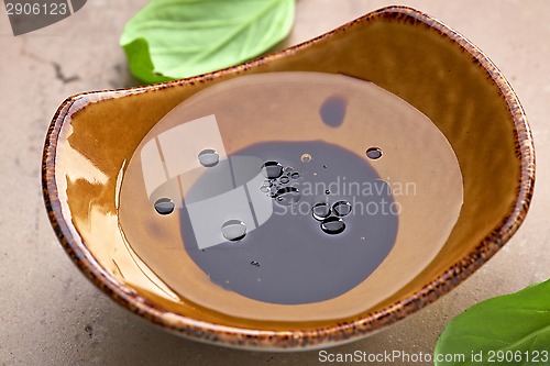 Image of Bowl of oil and balsamic vinegar