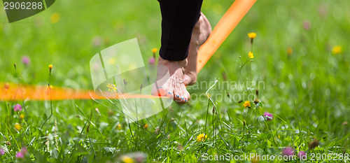 Image of Slack line in the city park.