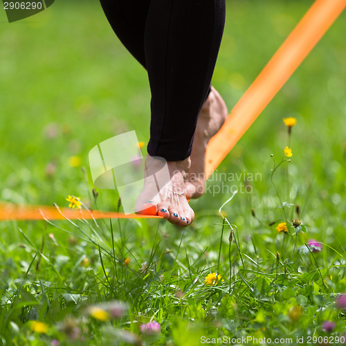 Image of Slack line in the city park.