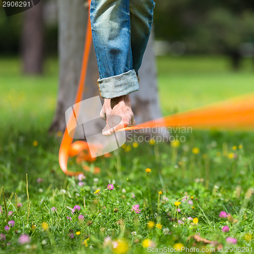 Image of Slack line in the city park.