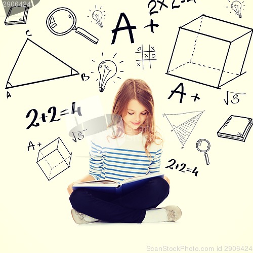 Image of student girl studying and reading book