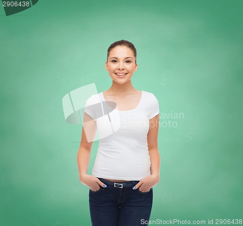 Image of smiling young woman in blank white t-shirt