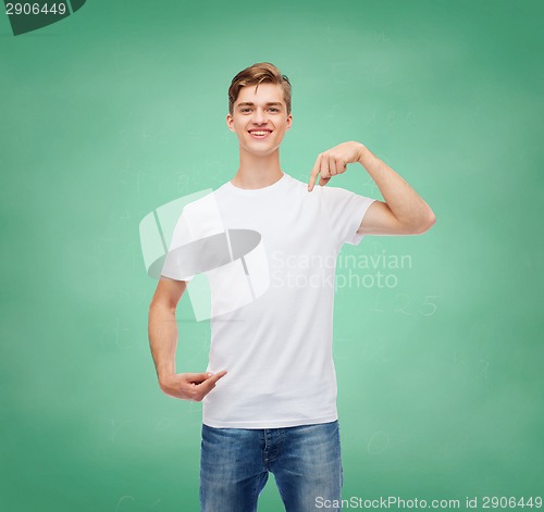 Image of smiling young man in blank white t-shirt