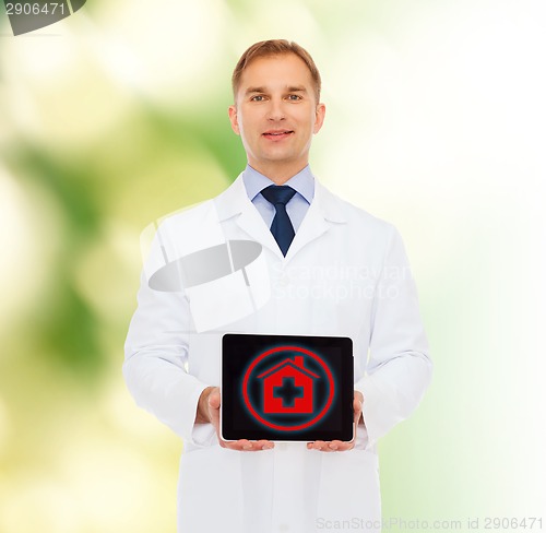 Image of smiling male doctor with tablet pc