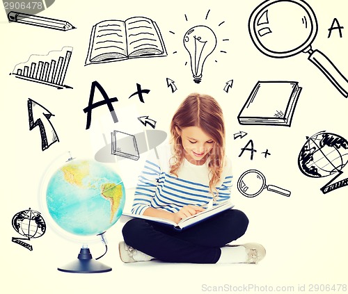 Image of girl with globe and book