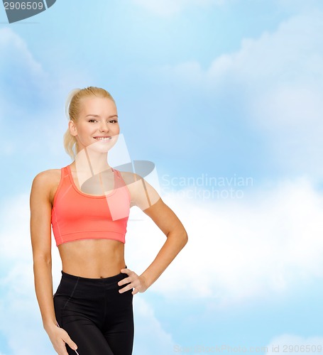 Image of beautiful athletic woman in sportswear