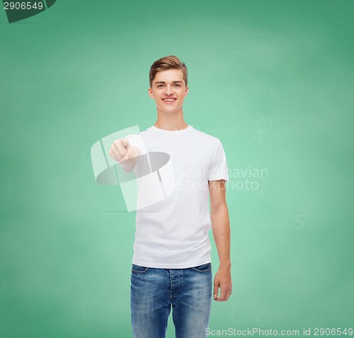 Image of smiling young man in blank white t-shirt