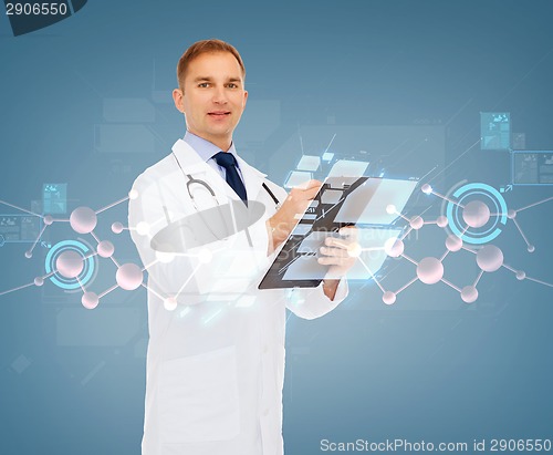 Image of smiling male doctor with clipboard and stethoscope