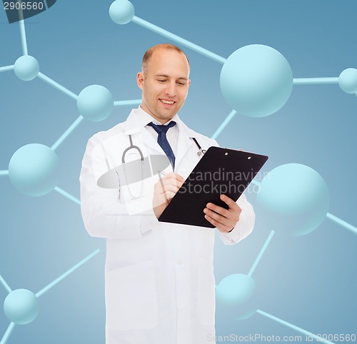 Image of smiling male doctor with clipboard and stethoscope