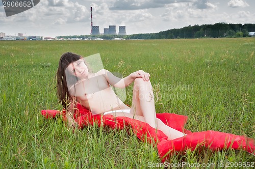 Image of Beautiful nude woman on grass