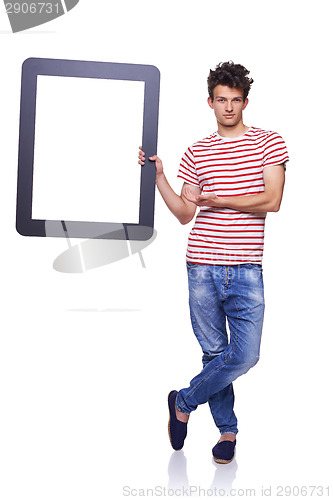 Image of Full length man holding empty frame