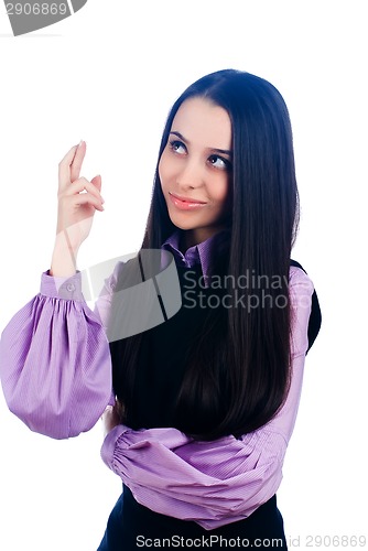 Image of Attractive girl with crossed fingers