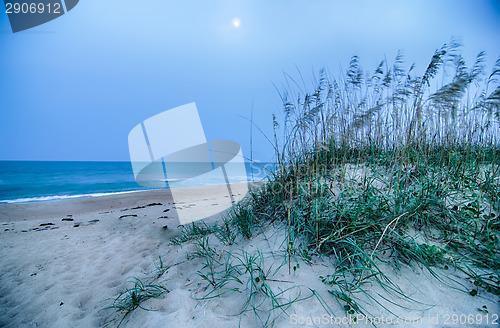 Image of Beautiful empty beach at sunrise 