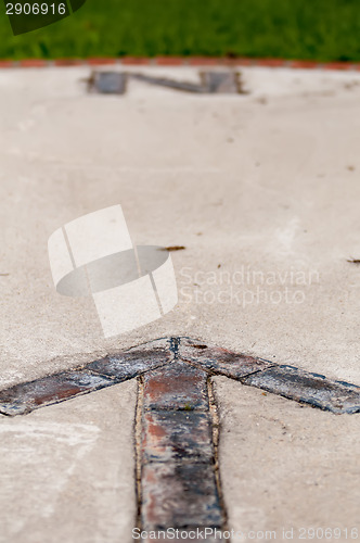 Image of brick paver north arrow compass