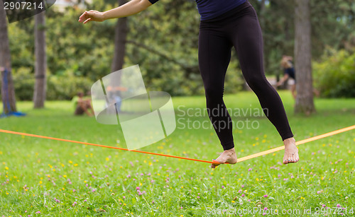 Image of Slack line in the city park.