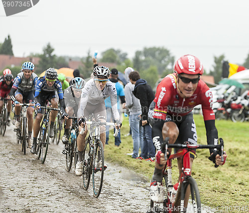 Image of The Cyclist Romain Bardet on a Cobbled Road - Tour de France 201