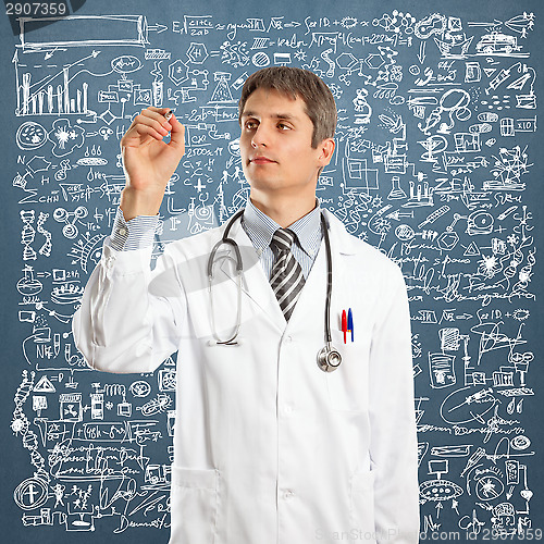Image of Doctor Male Writing Something