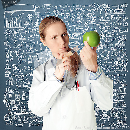 Image of scientist woman with apple
