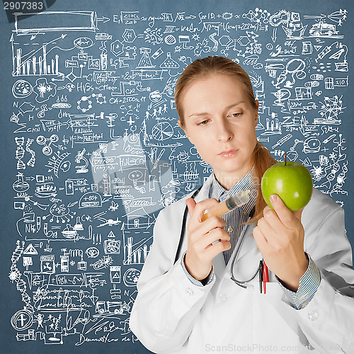 Image of scientist woman with apple