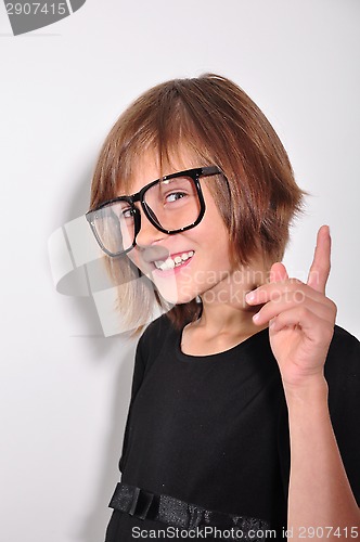 Image of child wearing glasses