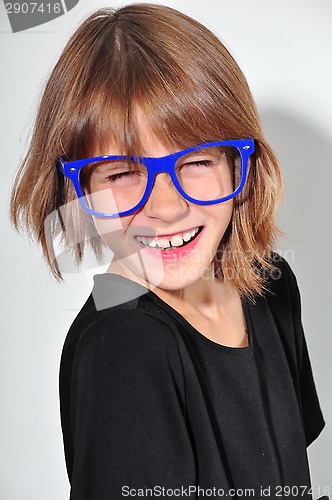 Image of kid with glasses having fun