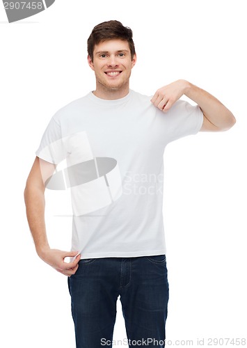 Image of smiling young man in blank white t-shirt