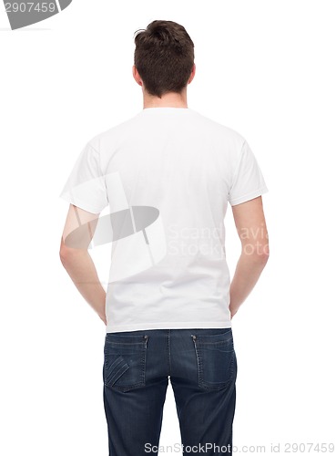 Image of young man in blank white t-shirt from back