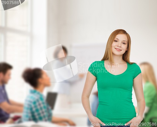 Image of smiling teenage girl in casual clothes