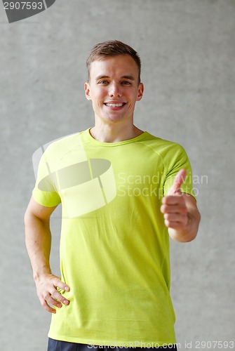 Image of smiling man in gym
