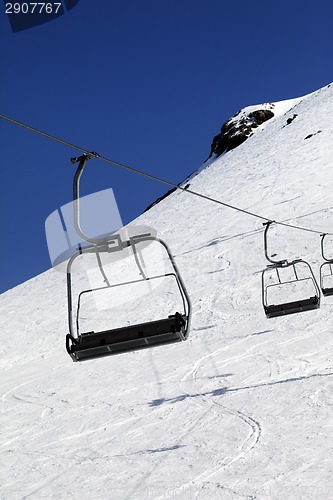 Image of Chair-lift in ski resort at sun day