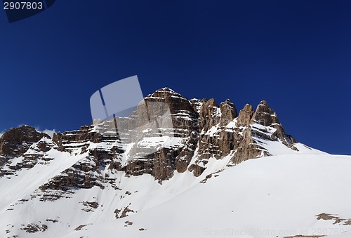 Image of Panorama of snowy rocks at nice spring day