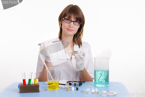 Image of Chemist with tweezers