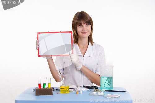 Image of Teacher holding plate