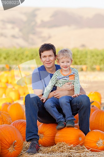 Image of family at pumpkin patch